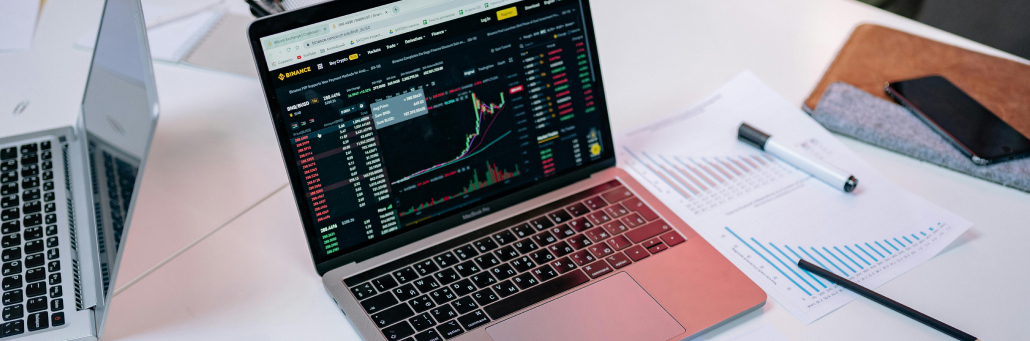 stocks on laptop screen - internet for finance - Fireline Broadband