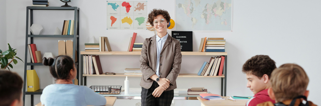 teacher in classroom of students - Fireline Broadband