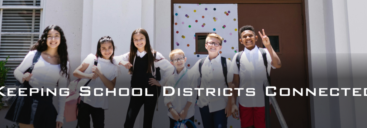 keeping school districts connected with picture of group of students outside front of school - Fireline Broadband