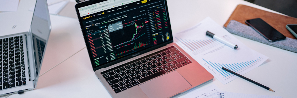 laptop on table of papers - SLA - Fireline Broadband