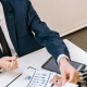 business people at a meeting - static ip address by Fireline Broadband
