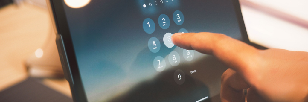 person typing in numerical password - AI in Cybersecurity - Fireline Broadband