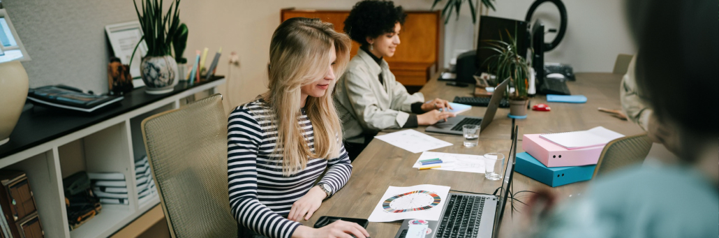 business people working together on their laptops in office - AI Ready Infrastructure - Fireline Broadband