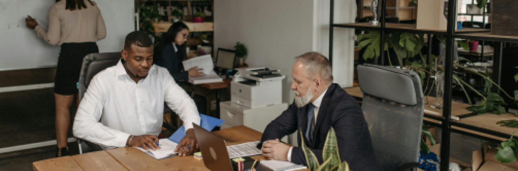 business people working together on their laptops in office - AI Ready Infrastructure - Fireline Broadband