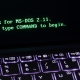 computer with lines of code - ddos - network segmentation Fireline Broadband